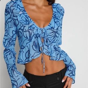 Tiger Mist Blue Tie Front Ruffle Long
Sleeve Sheer Tarvey Top